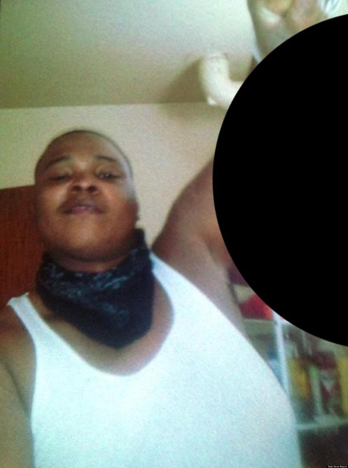 Photo: Son posed with mother's severed head